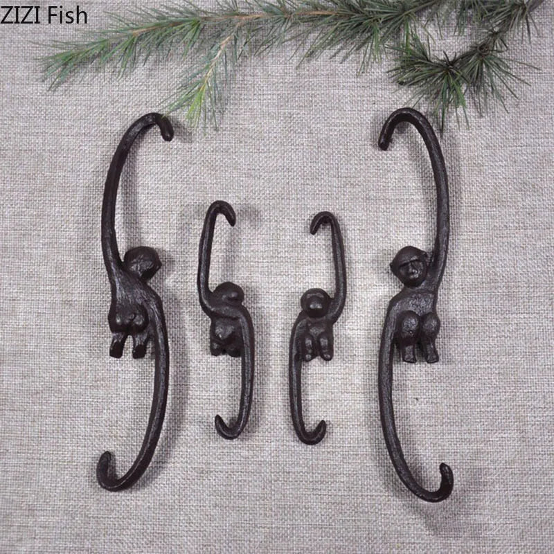 Afralia™ Monkey S Shape Hook Shelf: Cast Iron Decorative Coat Rack for Pastoral Outdoor Decor