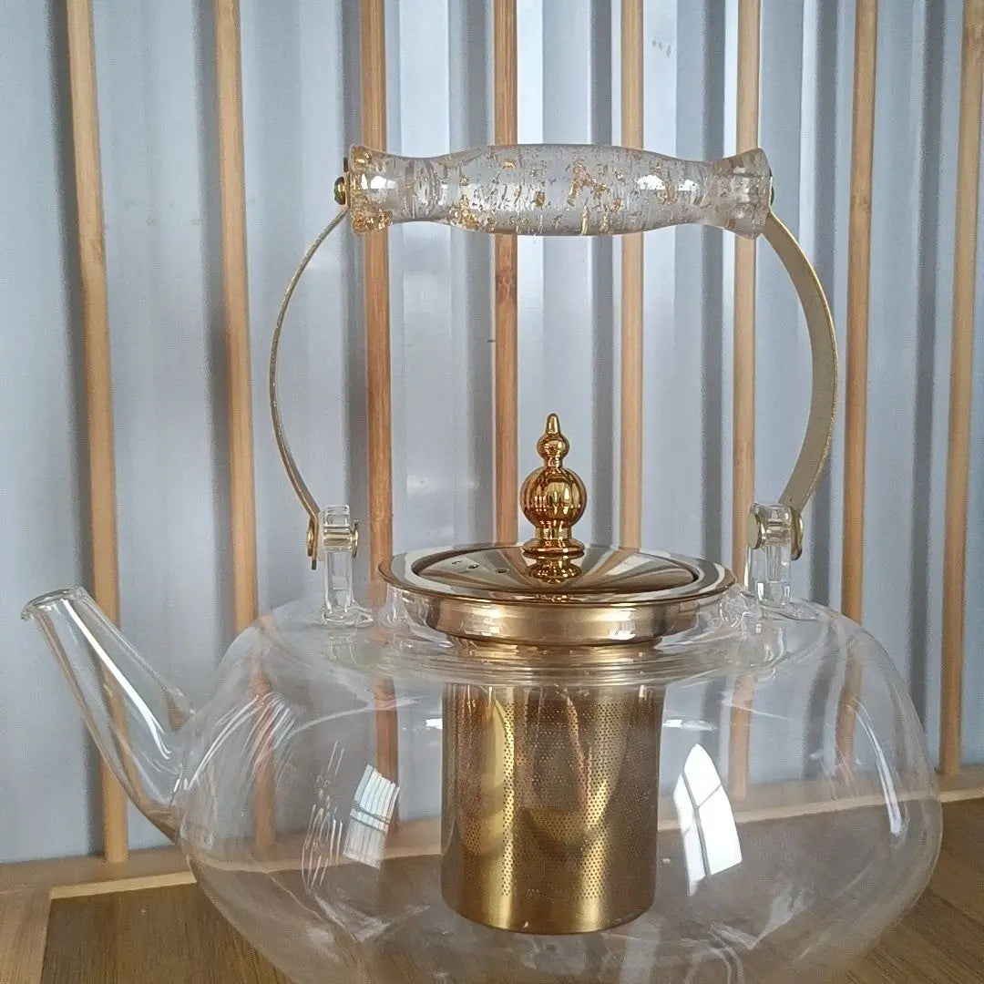 Afralia™ Amber Glass Teapot Filter, Heat-Resistant, Pumpkin-Shaped, Ideal for Boiling and Brewing Tea