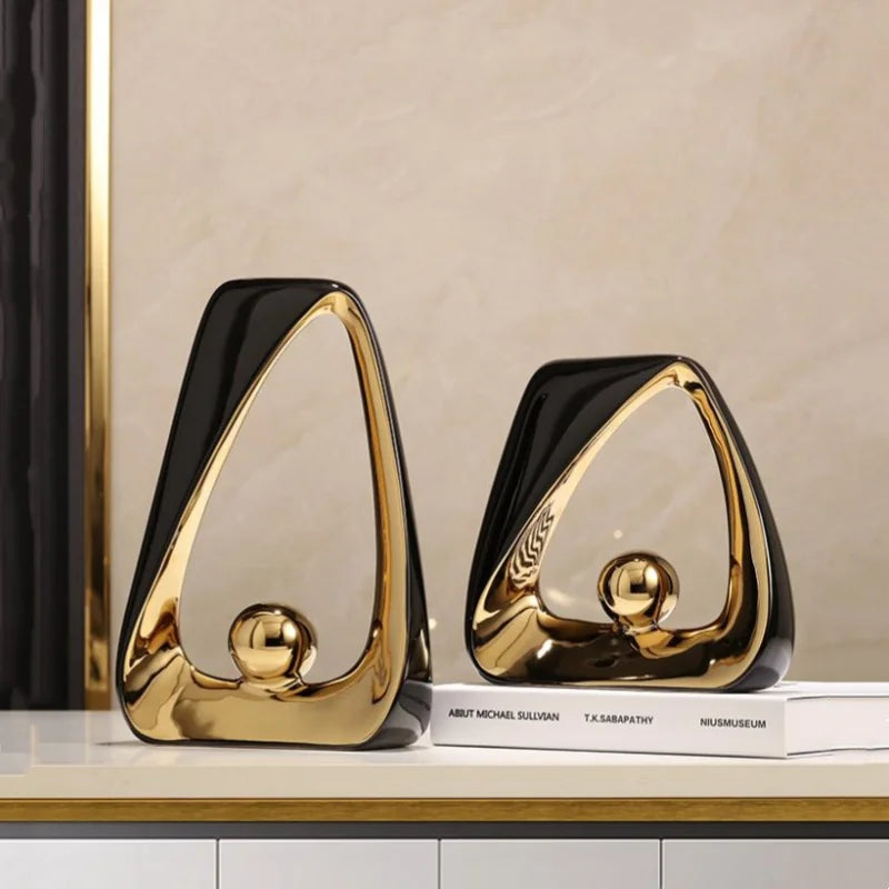 Afralia™ Geometric Triangles Golden Ball Skeleton Sculpture: Abstract Home Decor Figurine