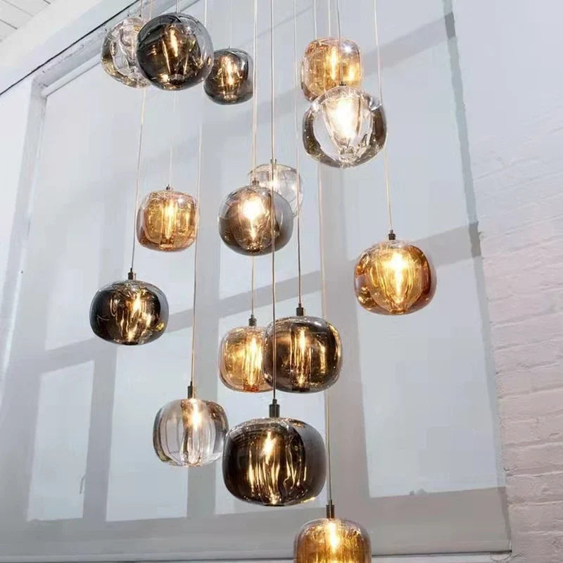 Afralia™ Crystal Staircase Chandelier: Luxury Amber/Smoky Grey/Clear LED Hanging Lamp