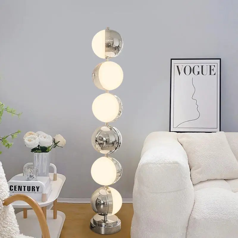 Afralia™ Stainless Steel Spherical Rotating Floor Lamp for Atmosphere and Retro Space