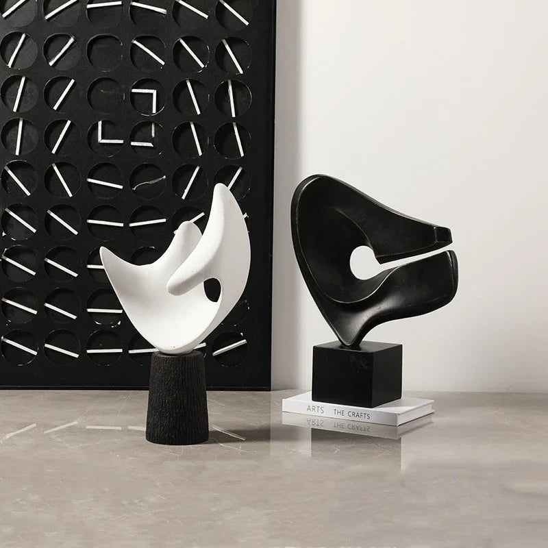 Afralia™ Abstract Hollowed-out Resin Sculpture, Black and White Modern Home Decor Statue.