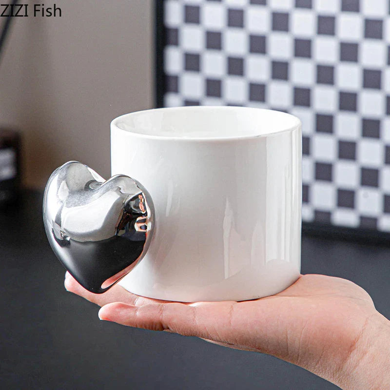 Afralia™ Silver Heart Handle Mug - Ceramic Coffee Cup for Dining Table or Afternoon Tea