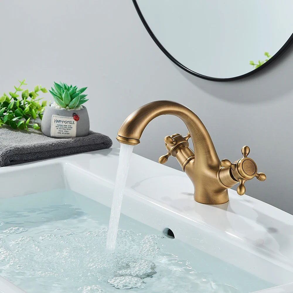 Afralia™ Antique Brass Dual Handle Basin Faucet Deck Mounted Bathroom Mixer Tap