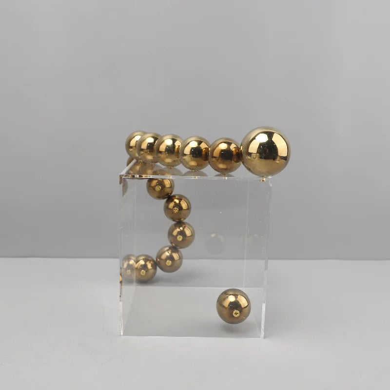 Afralia™ Geometric Sculpture: Clear Acrylic Cube with Golden Ball, Metal Cover; Home Decoration Accessory