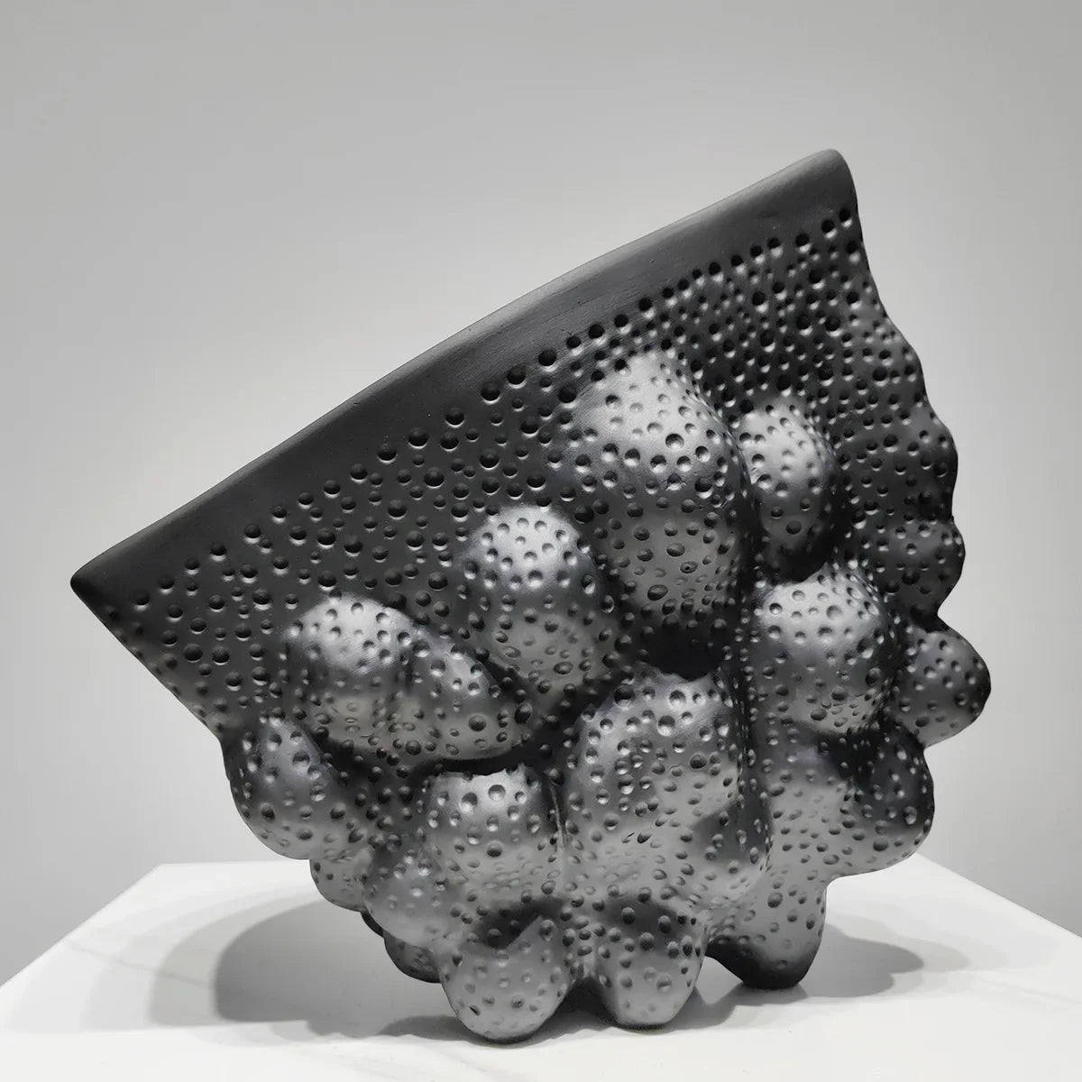 Afralia™ Black Ceramic Pleated Vase for Stylish Flower Arrangements