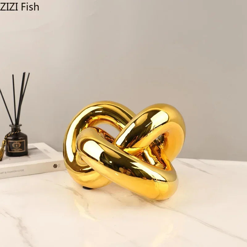 Afralia™ Gold-plated Knot Ornaments: Modern Geometric Resin Desk Decor & Room Craft