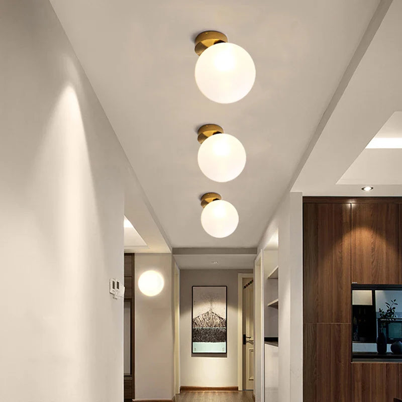 Afralia™ Glass Ball Wall Lamp: Modern Nordic Design for Bedroom, Living Room, Study & Aisle