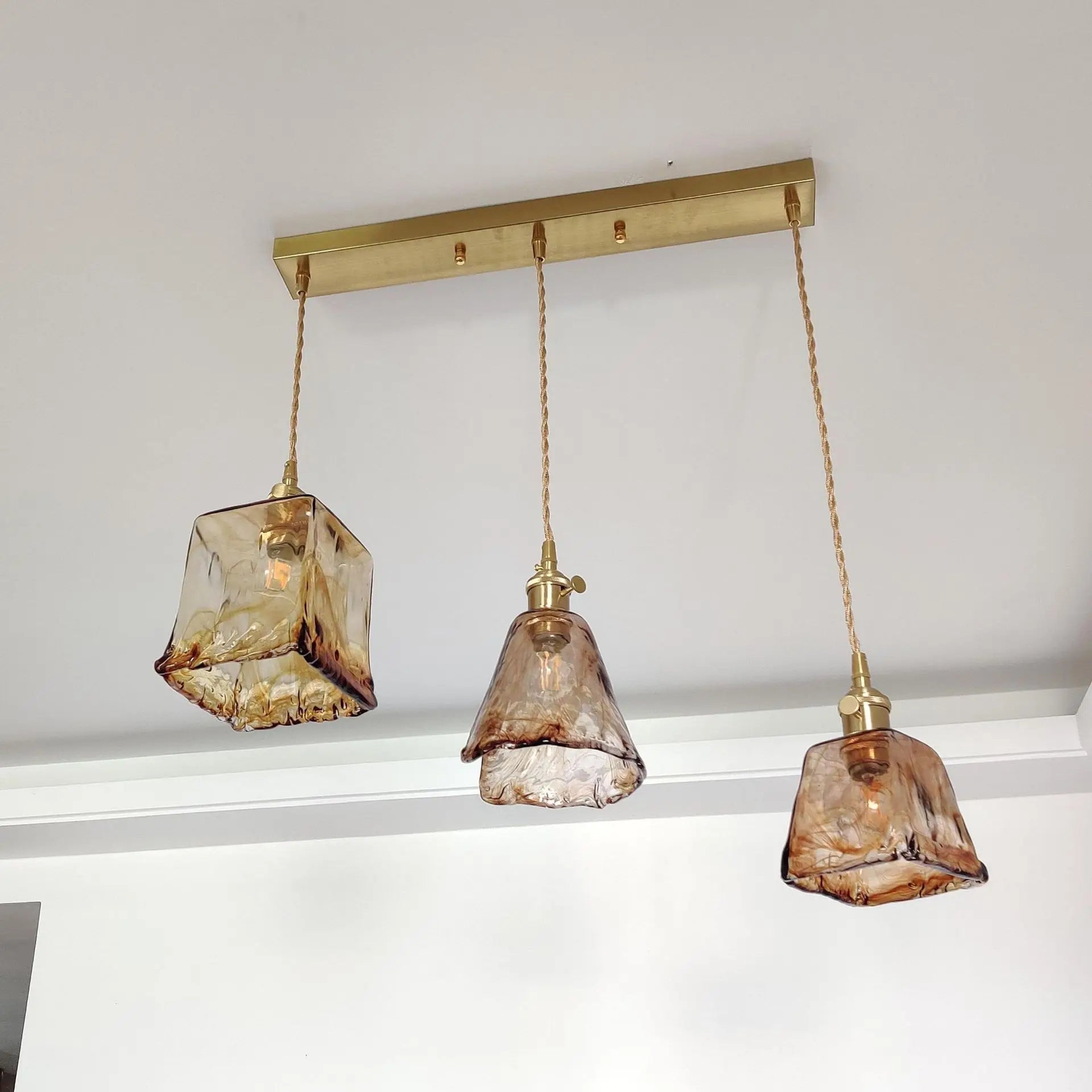 Afralia™ Nordic Amber Glass Pendant Lights with Vintage Copper Finish