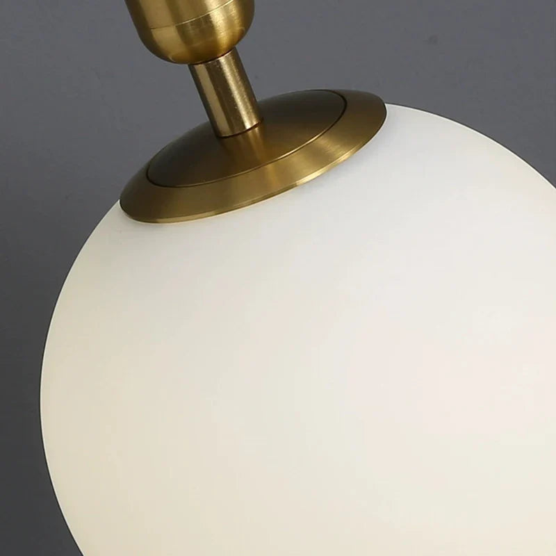 Afralia™ Glass Ball Wall Lamp Brass/Black Sconce for Living Room Bedroom Reading