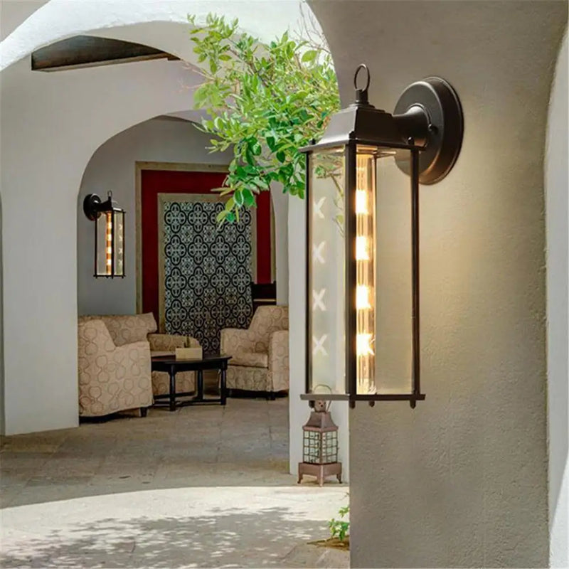 Afralia™ Black Finish Wall Lantern with Frosted Glass Shade for Outdoor Use