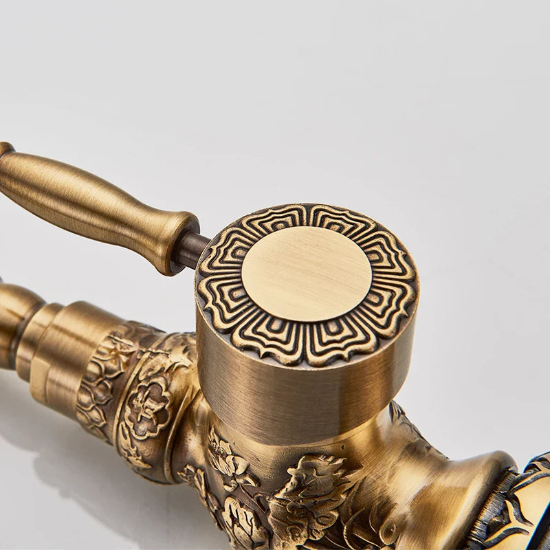 Afralia™ Antique Brass Basin Faucet Long Spout Flower Carved Sink Tap 360 Rotation