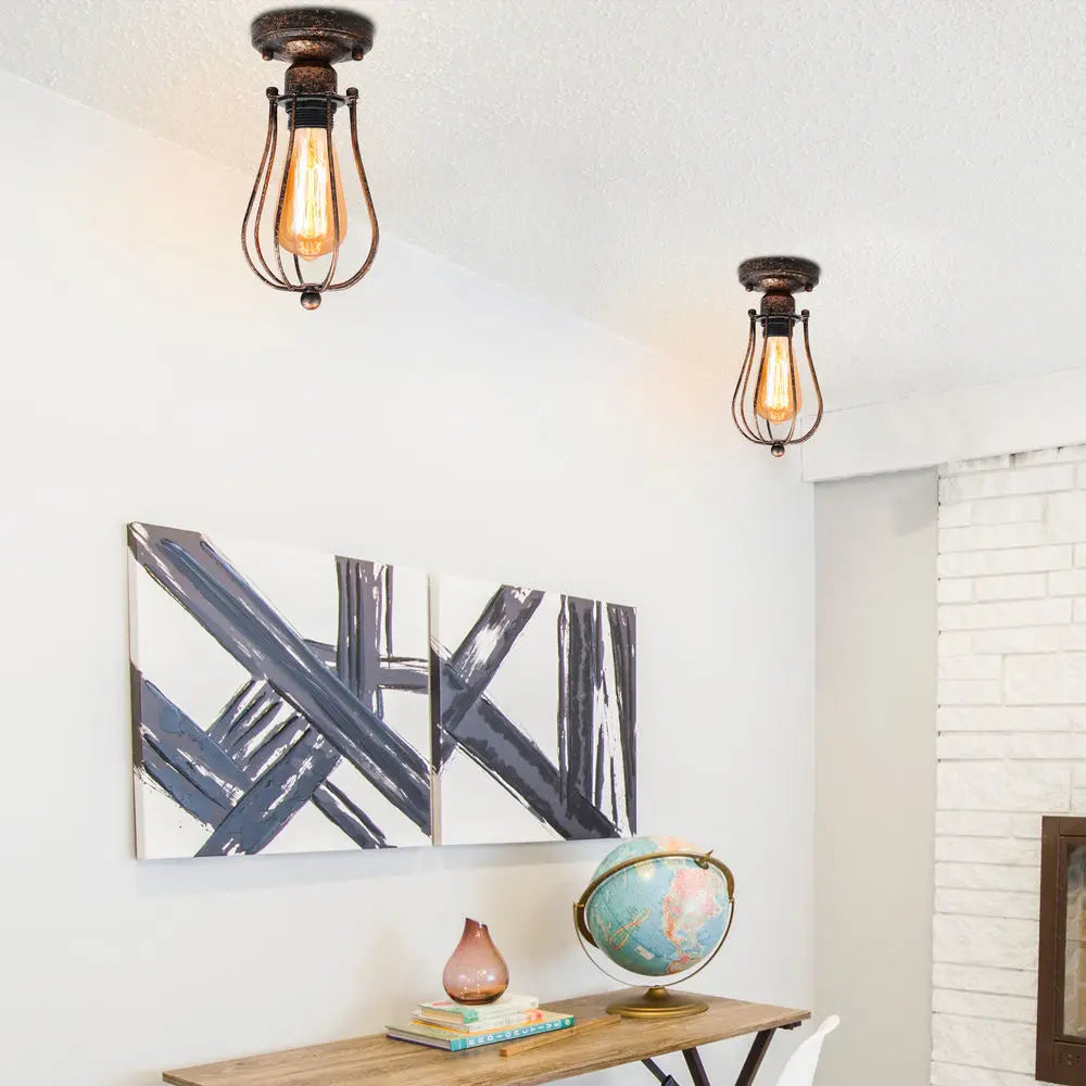Afralia™ Adjustable Industrial Wall Light Rustic Wire Metal Cage Sconce