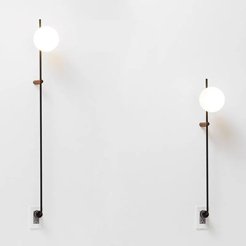 Afralia™ Nordic Vintage Black Iron Ball Wall Lamp with Long Arm E14 Bulb