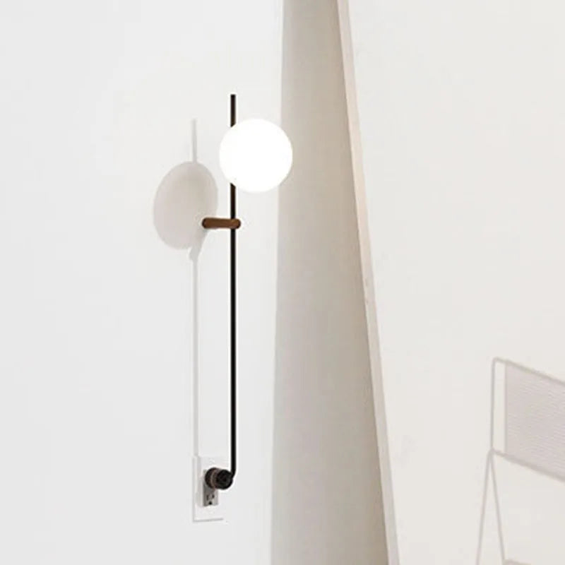 Afralia™ Nordic Vintage Black Iron Ball Wall Lamp with Long Arm E14 Bulb