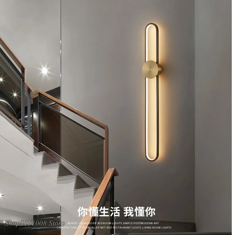 Afralia™ Modern Golden Black Oval Wall Lamps for Living Room Staircase and Bedside Decor