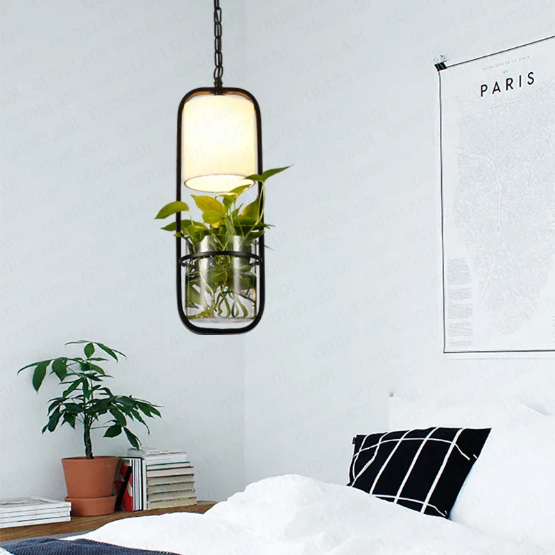 Afralia™ Minimalist Black Cage Plant Pendant Light Pyramid Iron Lamp E14 Loft Design