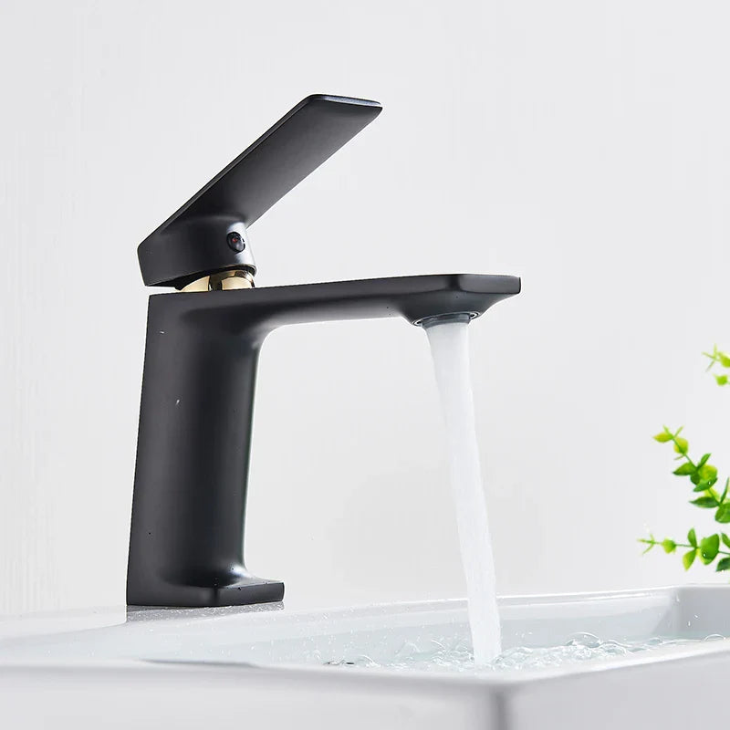 Afralia™ Black Gold Basin Faucet: Stylish Deck Mounted Bathroom Sink Faucet with Gold Handle