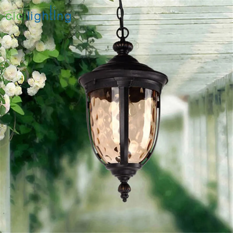 Afralia™ Rustic Outdoor Hanging LED Pendant Lights with Hammered Glass