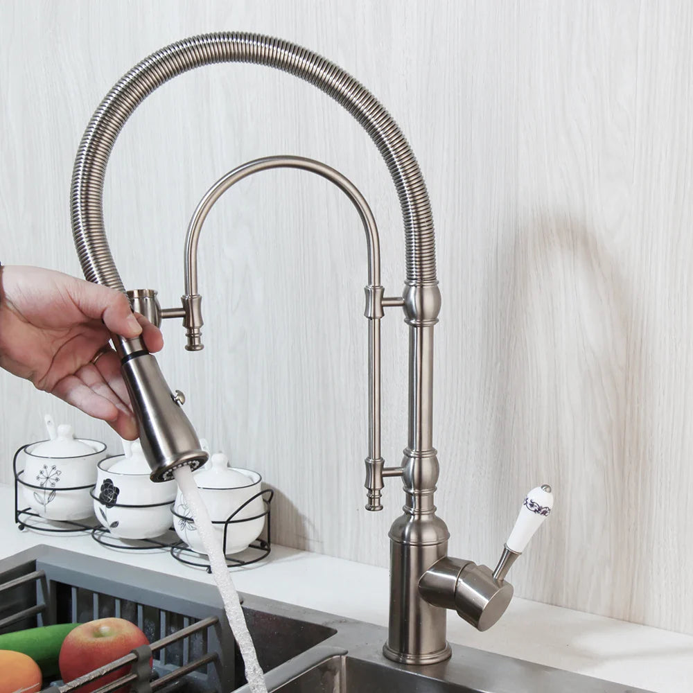 Afralia™ Swivel Kitchen Faucet with Pull Down Spring Spray in Brushed Nickel