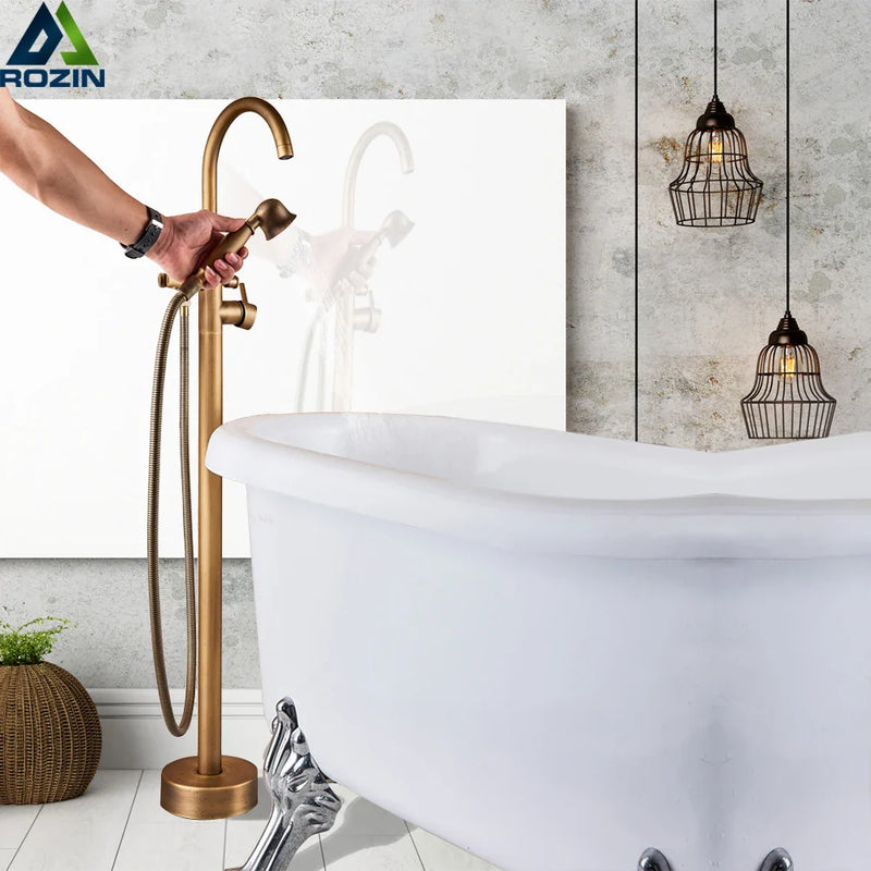 Afralia™ Antique Brass Floor Mount Tub Faucet Swivel Spout Shower Mixer Tap