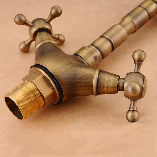 Afralia™ Antique Brass Double Cross Handle Basin Faucet - 360 Degree Swivel Spout