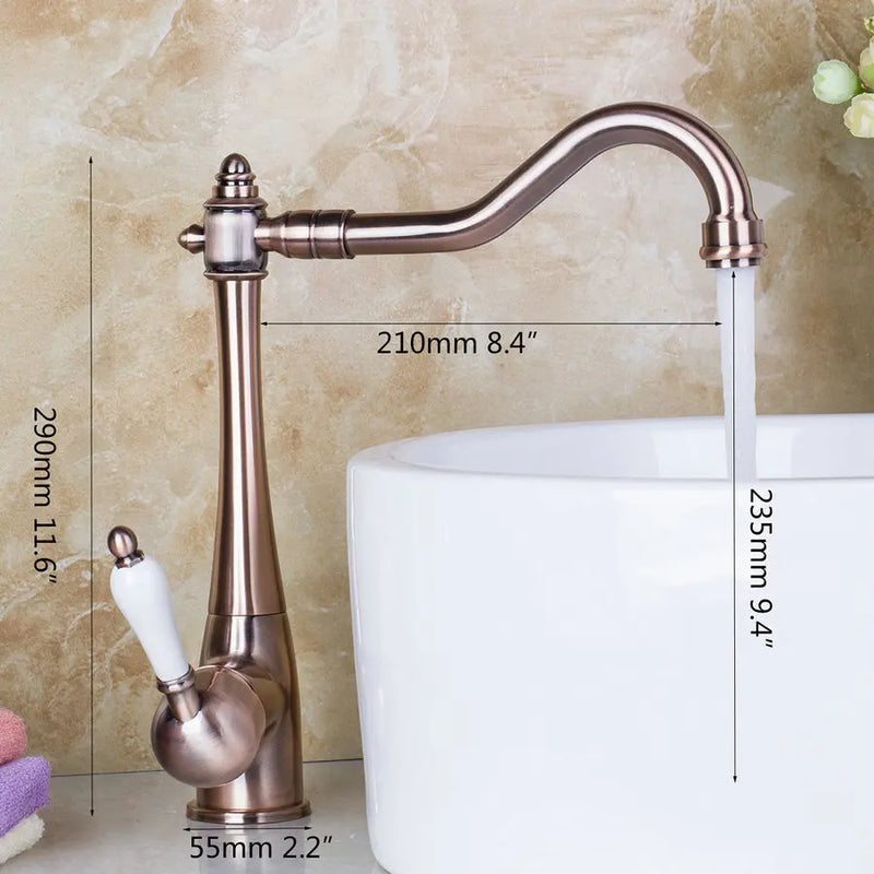 Afralia™ Antique Brass Swivel Kitchen Faucet with Ceramic Handle for Countertop Sink