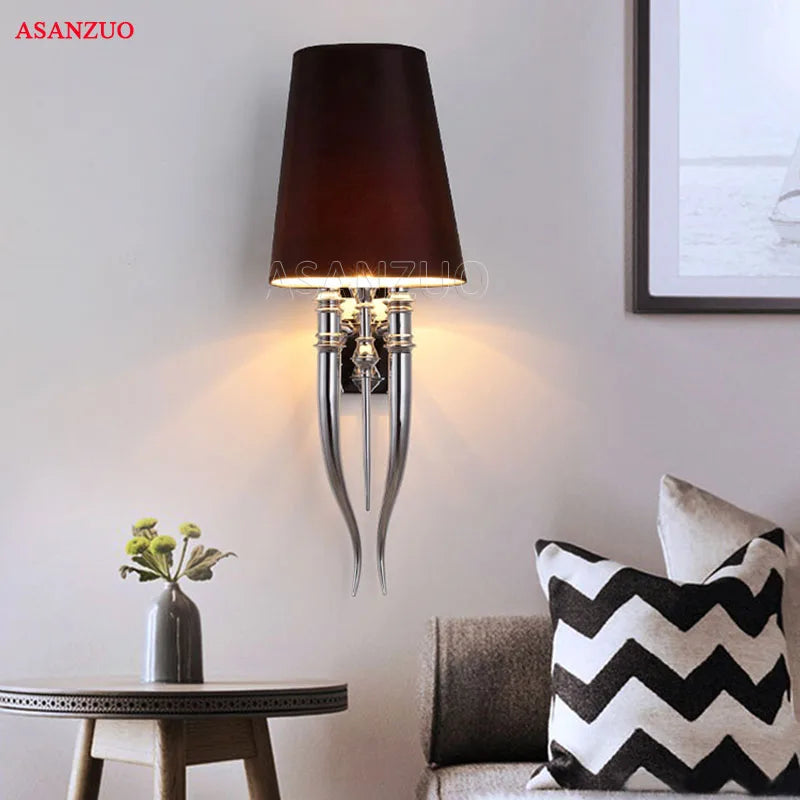 Afralia™ Iron Claw Horn Wall Sconce with Cloth Lampshade for Bedroom and Living Room