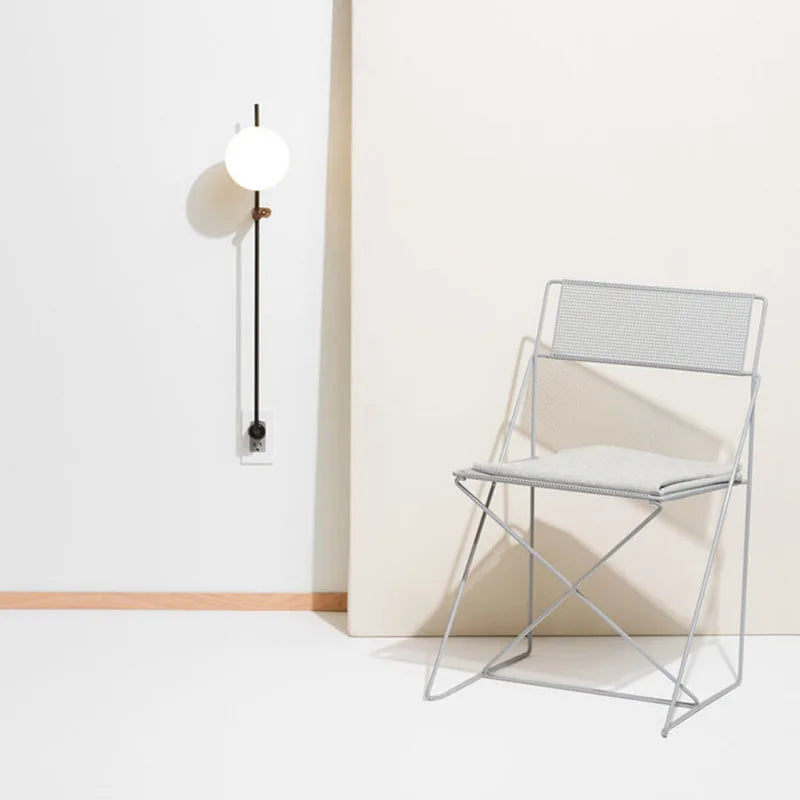 Afralia™ Nordic Vintage Black Iron Ball Wall Lamp with Long Arm E14 Bulb