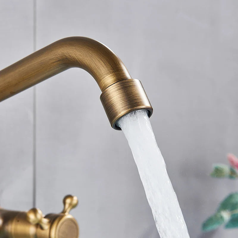 Afralia™ Antique Brass Kitchen Faucet with Swivel Spout and Dual Handle Mixer