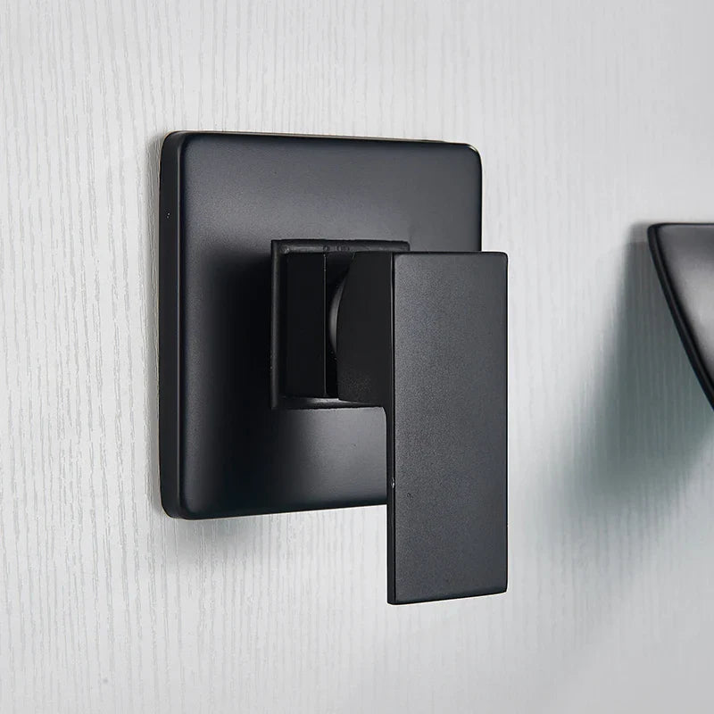 Afralia™ Matte Black Swivel Spout Wall Mount Basin Faucet Solid Brass Bathroom Mixer