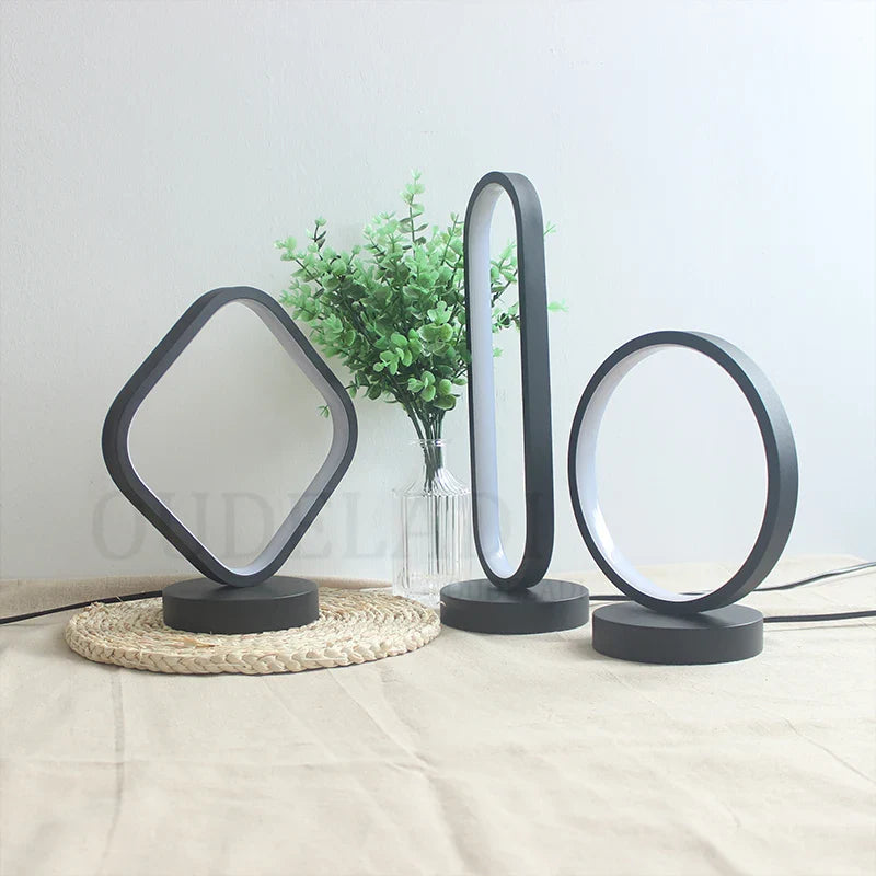 Afralia™ Modern Black Ring LED Table Lamp for Bedroom Decor