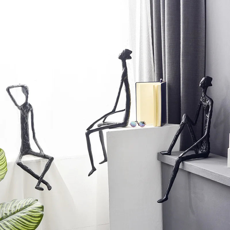 Afralia™ Nordic Hanging Foot Sitting Character Ornaments: Luxury Cast Iron Art for Decoration