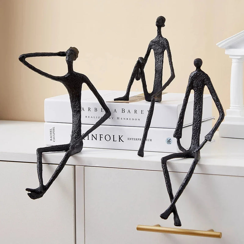 Afralia™ Nordic Hanging Foot Sitting Character Ornaments: Luxury Cast Iron Art for Decoration