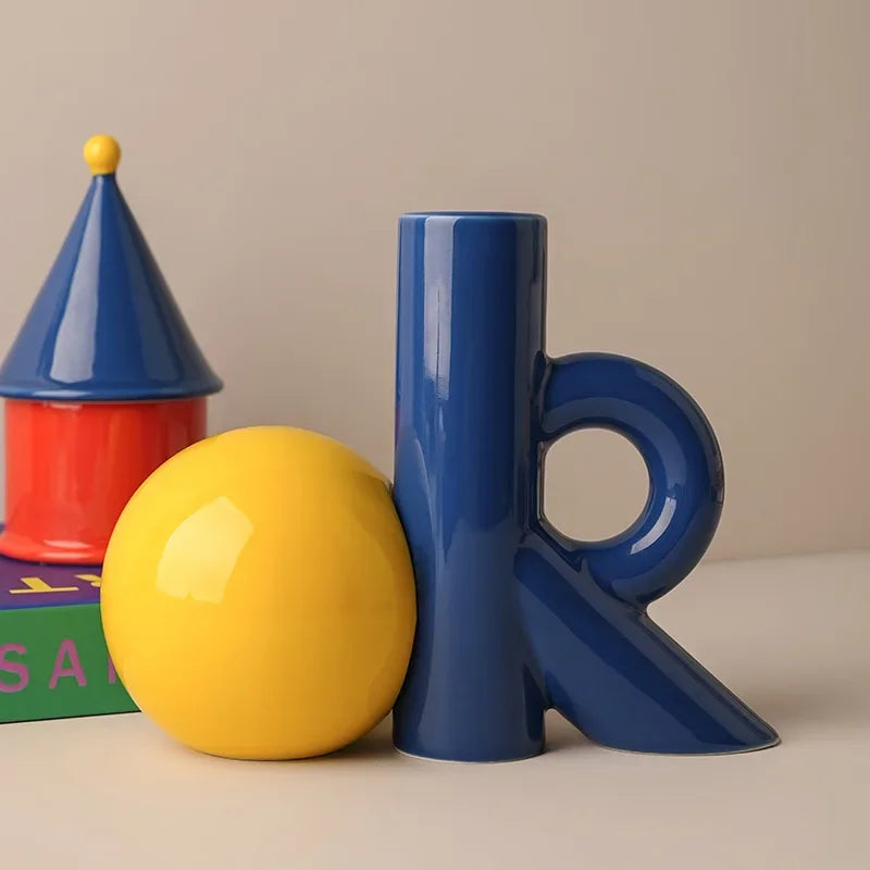 Afralia™ Cartoon Abstract Ceramic Vase with Cut-out Letter Design