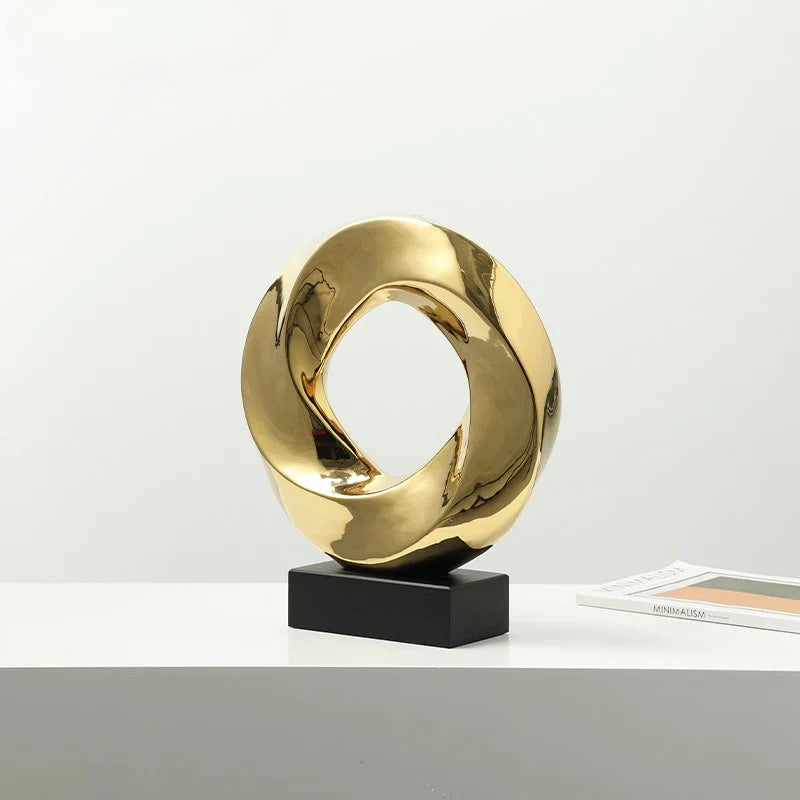 Afralia™ Geometric Gold Hollowed Twisted Circles Figurines Home Decor