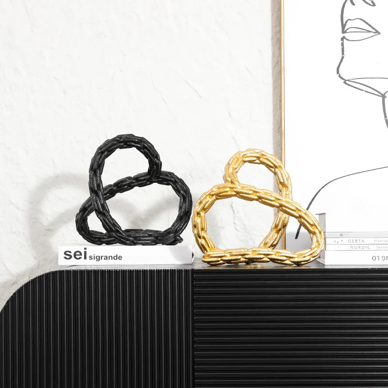 Afralia™ Golden Knot Chain Ring Geometric Decorative Figurine - Resin Home Decor Accessory