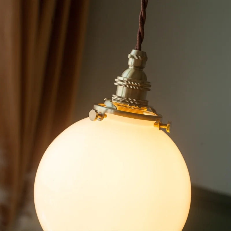 Afralia™ Cream Glass Ball LED Pendant Light for Kitchen Living Room Nordic Vintage Copper
