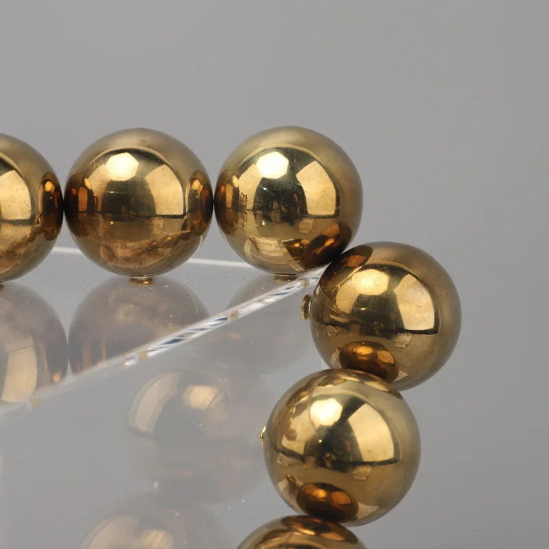 Afralia™ Geometric Sculpture: Clear Acrylic Cube with Golden Ball, Metal Cover; Home Decoration Accessory