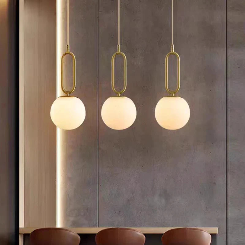 Afralia™ Brass LED Pendant Lights with Natural Marble Finish and Adjustable G9 Bulb