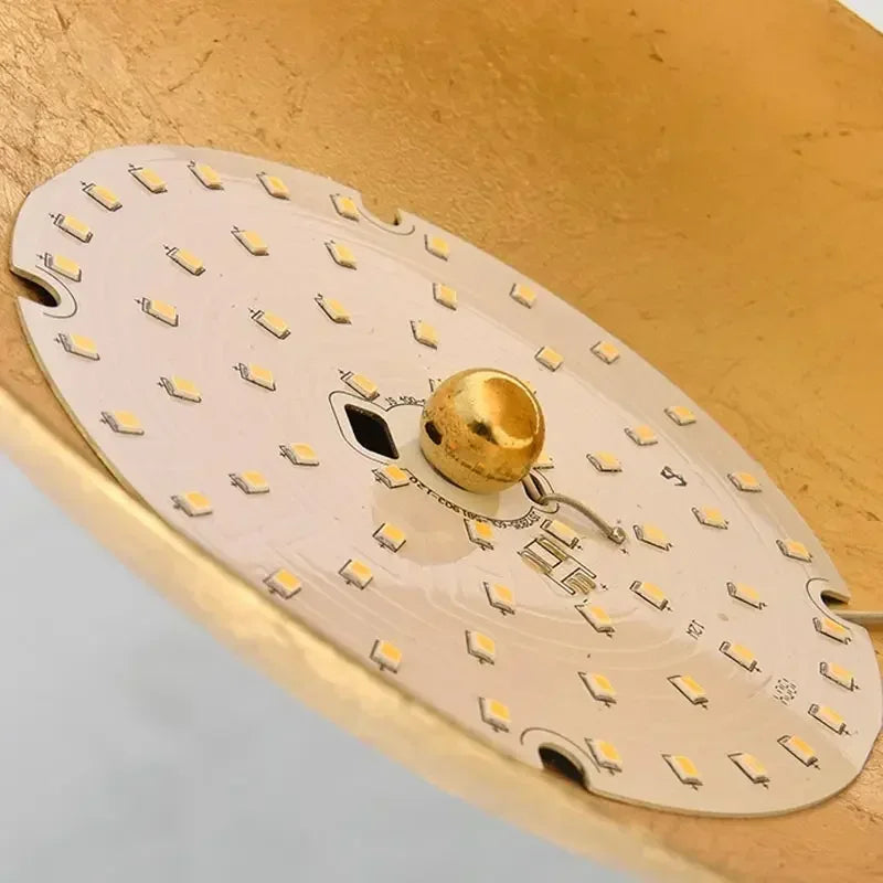 Afralia™ Rotatable Solar Eclipse LED Wall Lights in Black Gold Texture