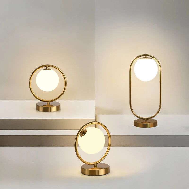 Afralia™ LED Brass Glass Table Lamp for Bedside Reading Desk - Modern Round Ring Design