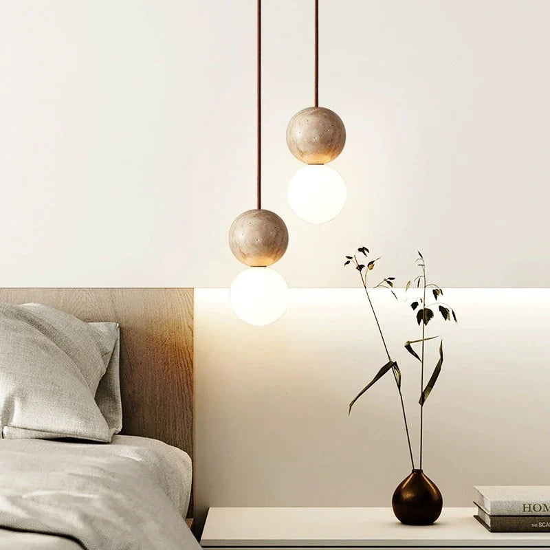 Afralia™ Stone Cream Pendant Light: Retro Round Ball Chandelier for Bedroom, Bar Table, or Bedside