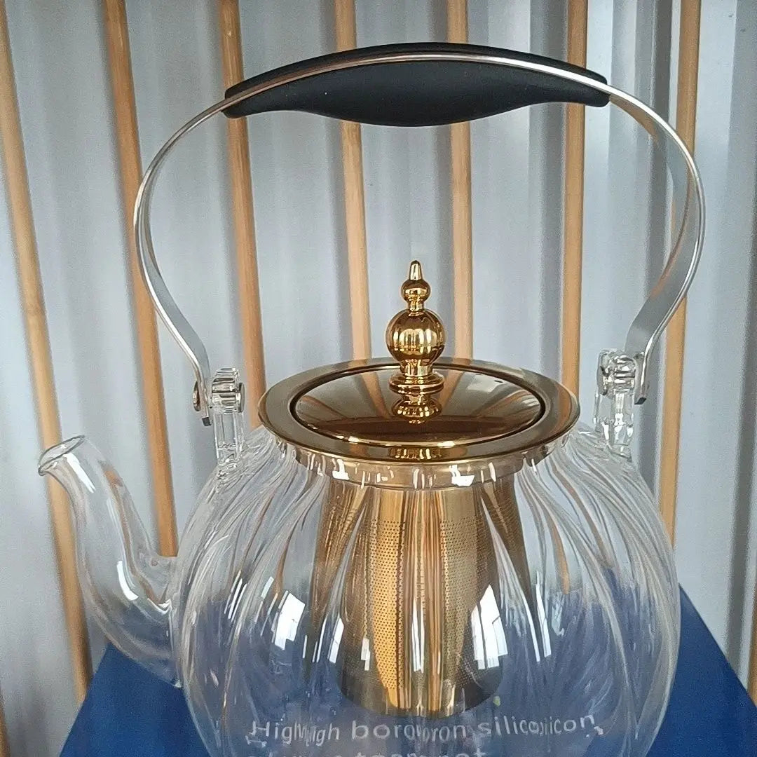 Afralia™ Amber Glass Teapot Filter, Heat-Resistant, Pumpkin-Shaped, Ideal for Boiling and Brewing Tea
