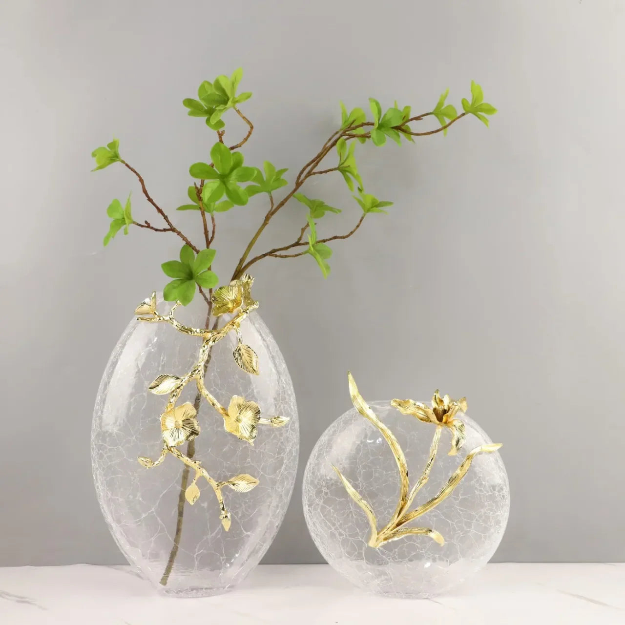 Afralia™ Round Golden Embossed Glass Vase for Home Decoration