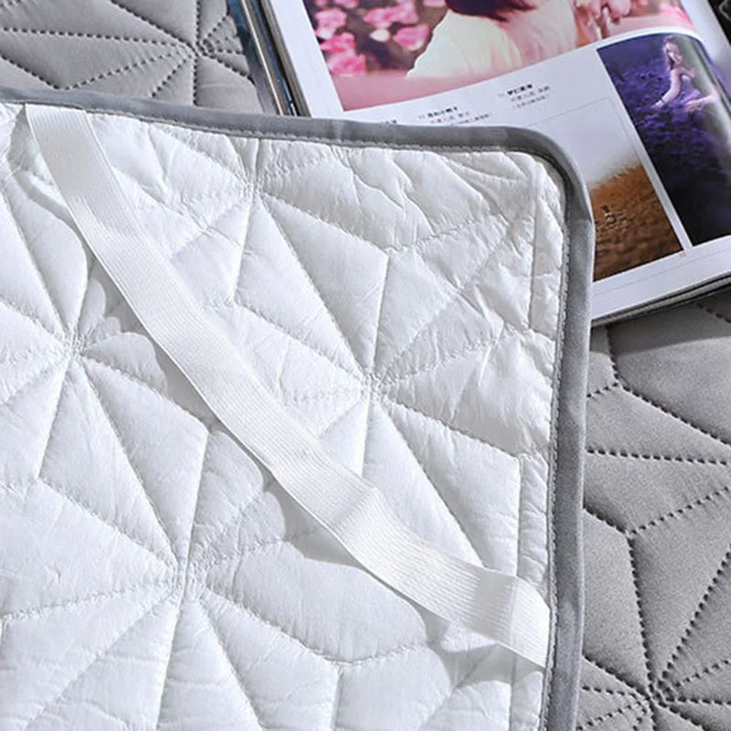 Afralia™ Quilted Waterproof Bed Pad Protector: Non-slip, Skin-friendly for Elderly & Children