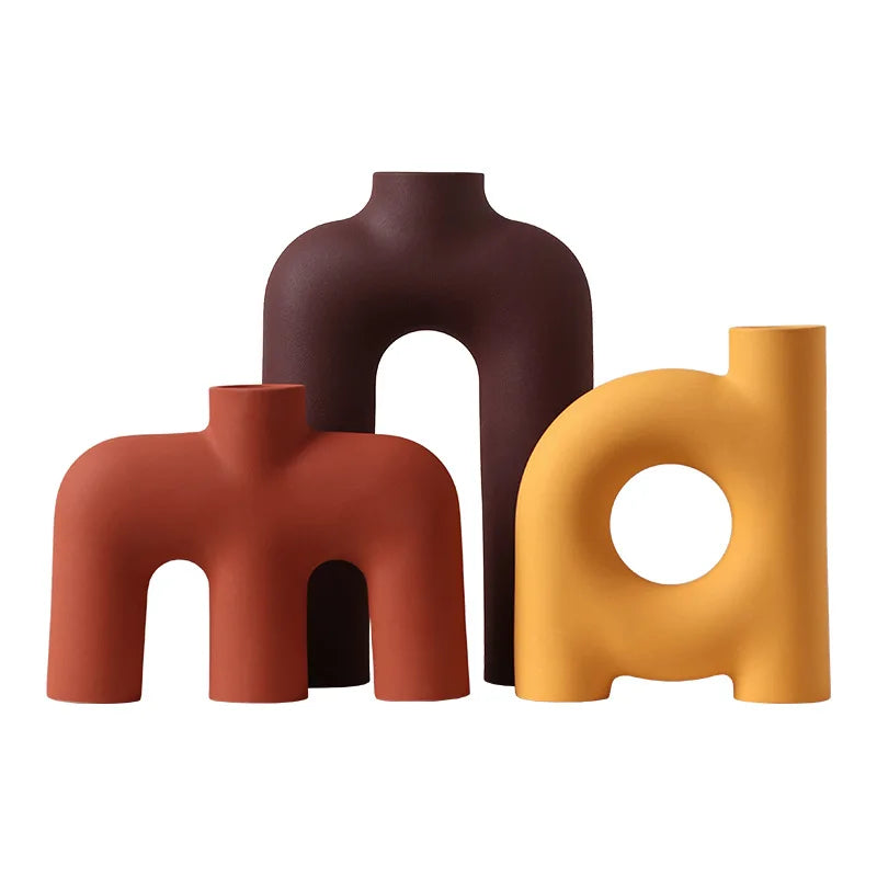 Afralia™ Geometric Ceramic Vase: Hollowed-out Letters Flower Arrangement Home Decor