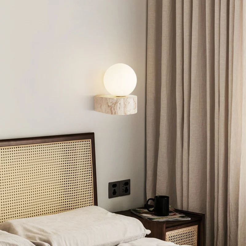 Afralia™ White Glass Globe LED Wall Light on Yellow Stone Base