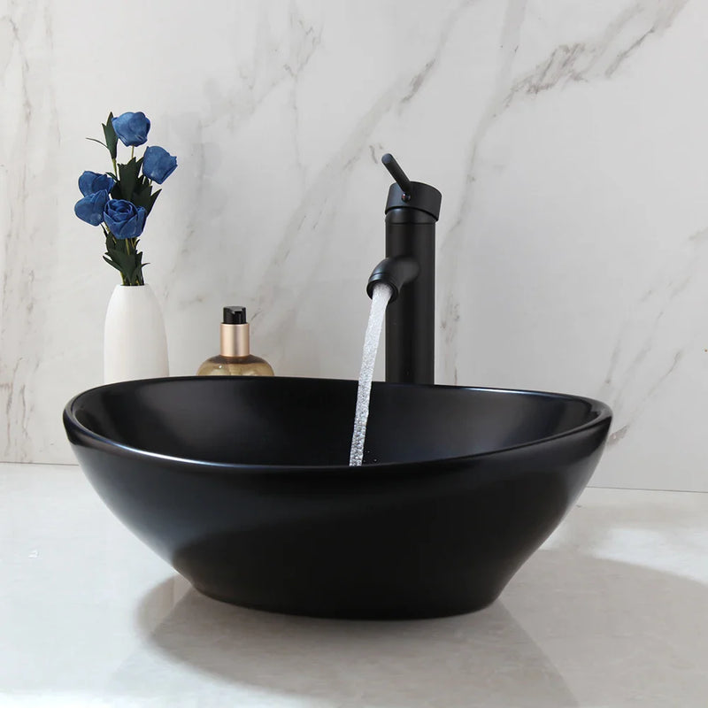 Afralia™ Matte Black Ceramic Oval Bathroom Bowl Sink with Brass Faucet Mixer Tap