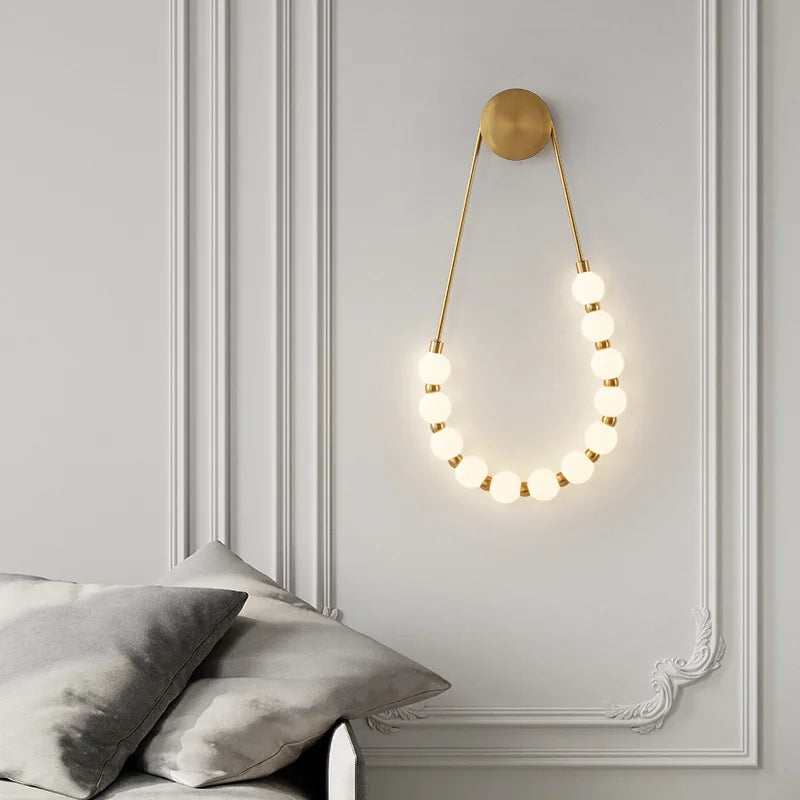 Afralia™ LED Necklace Wall Lights: Gold Black Metal White Acrylic Sconce for Home Art Deco